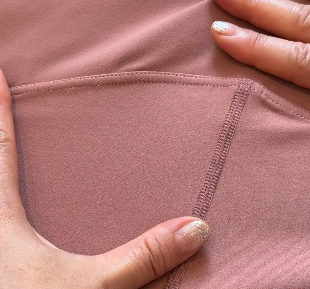 ISO 607 flatlock seam engineering for premium activewear